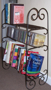 free standing wrought iron book case