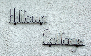 wrought iron house sign name